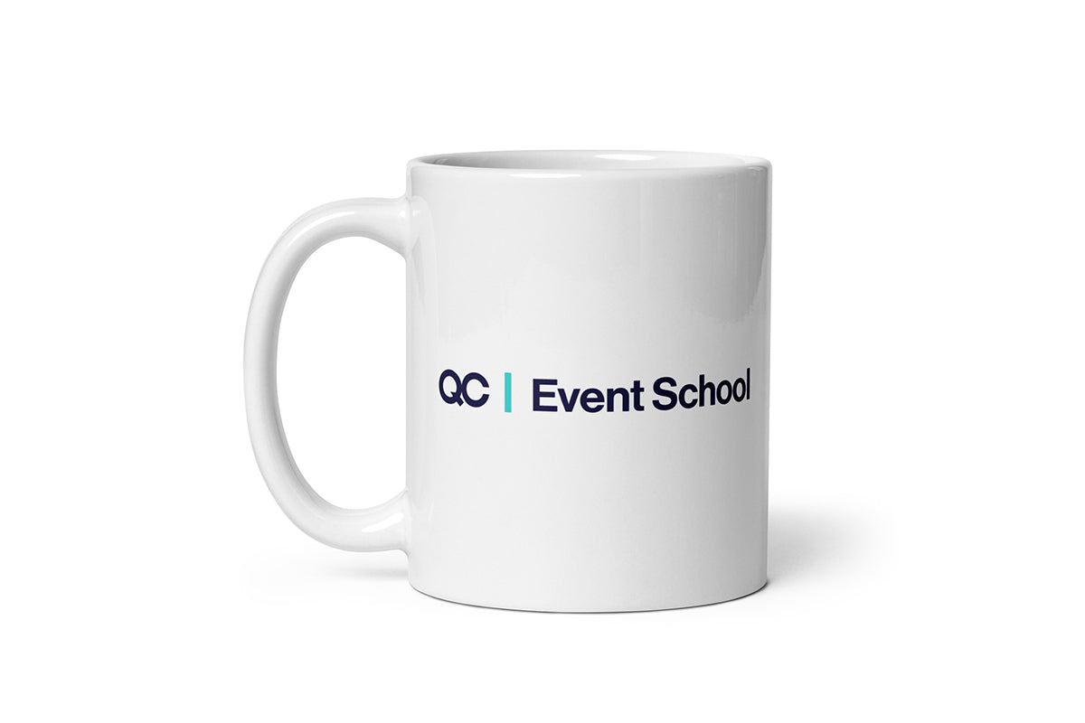 White mug with 'QC Event School' text on a white background