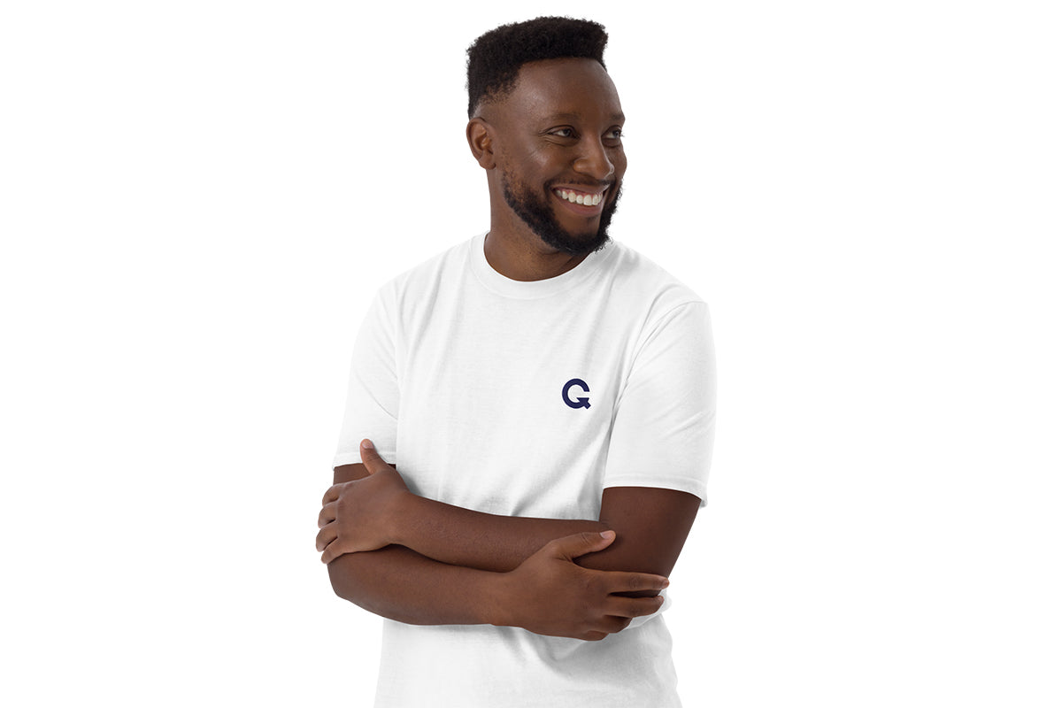 Man wearing a white t-shirt with a QC logo on a white background