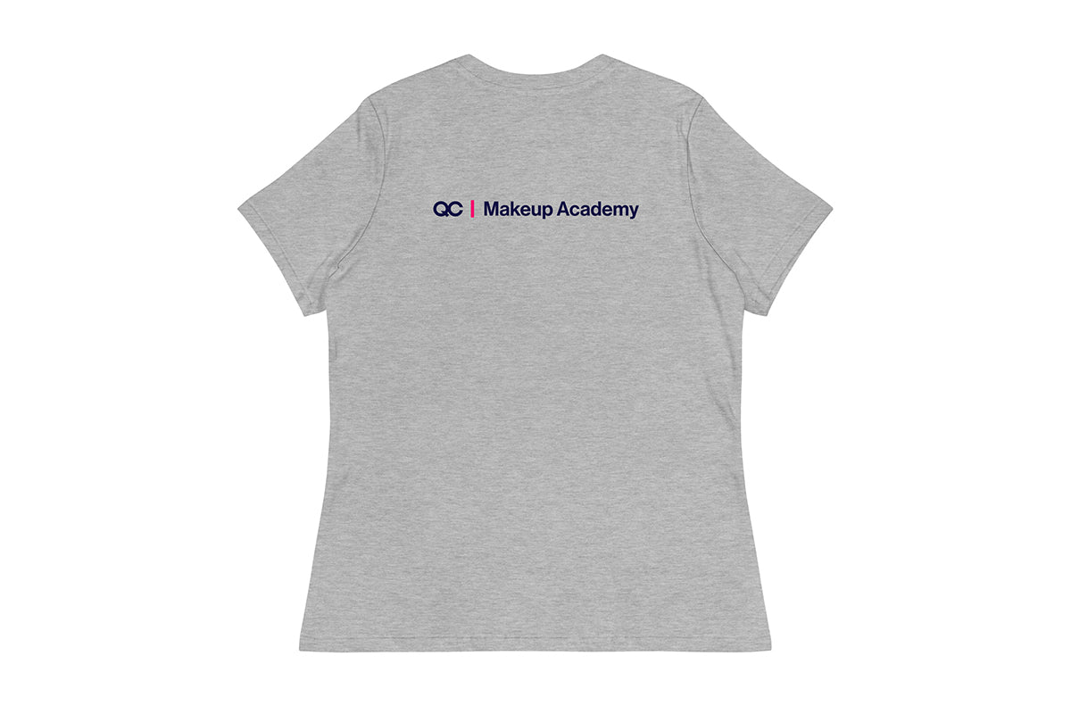 Back of gray t-shirt with 'QC Makeup Academy' text on the back against a white background