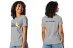 Woman wearing a gray t-shirt with text and a dog graphic on the front, and 'QC Pet Studies' text on the back.