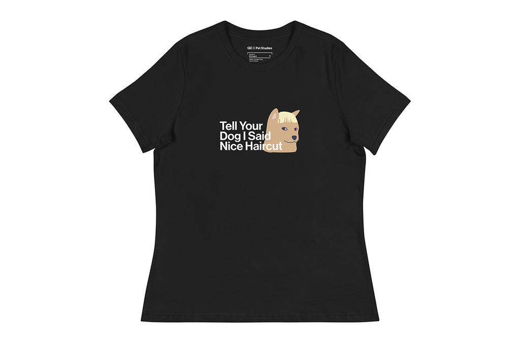 Black t-shirt with a graphic of a dog and text that reads "Tell Your Dog I Said Nice Haircut" on a white background