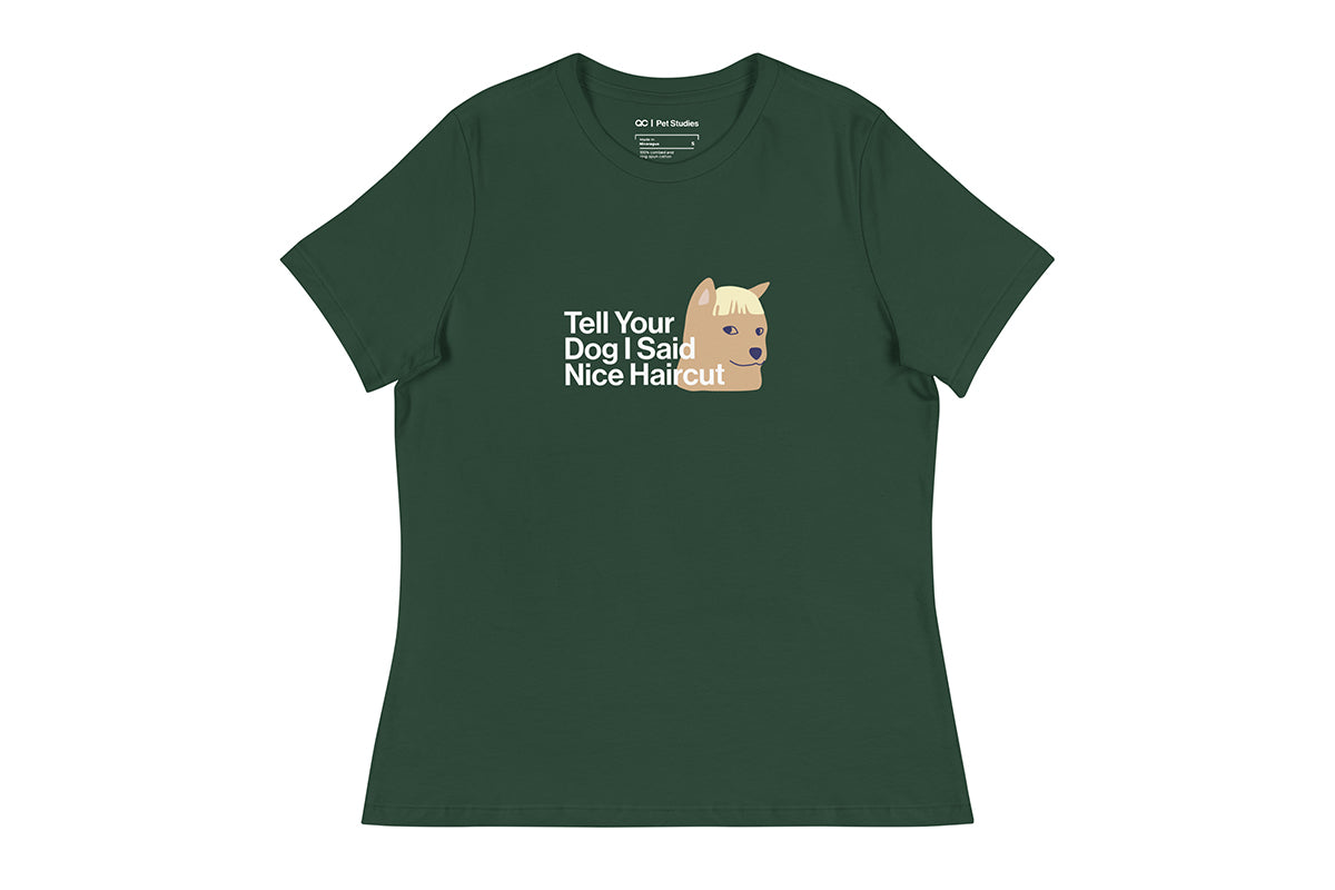Green t-shirt with a graphic of a dog and text that reads "Tell Your Dog I Said Nice Haircut" on a white background