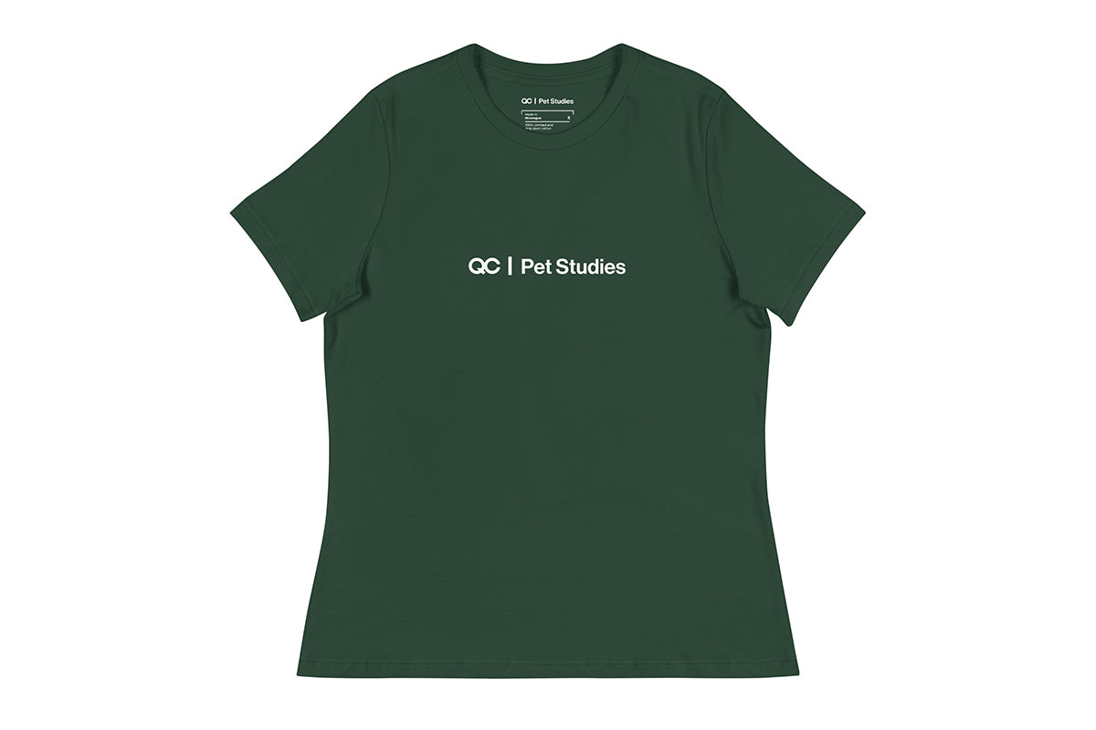 Green t-shirt with 'QC Pet Studies' text on a white background