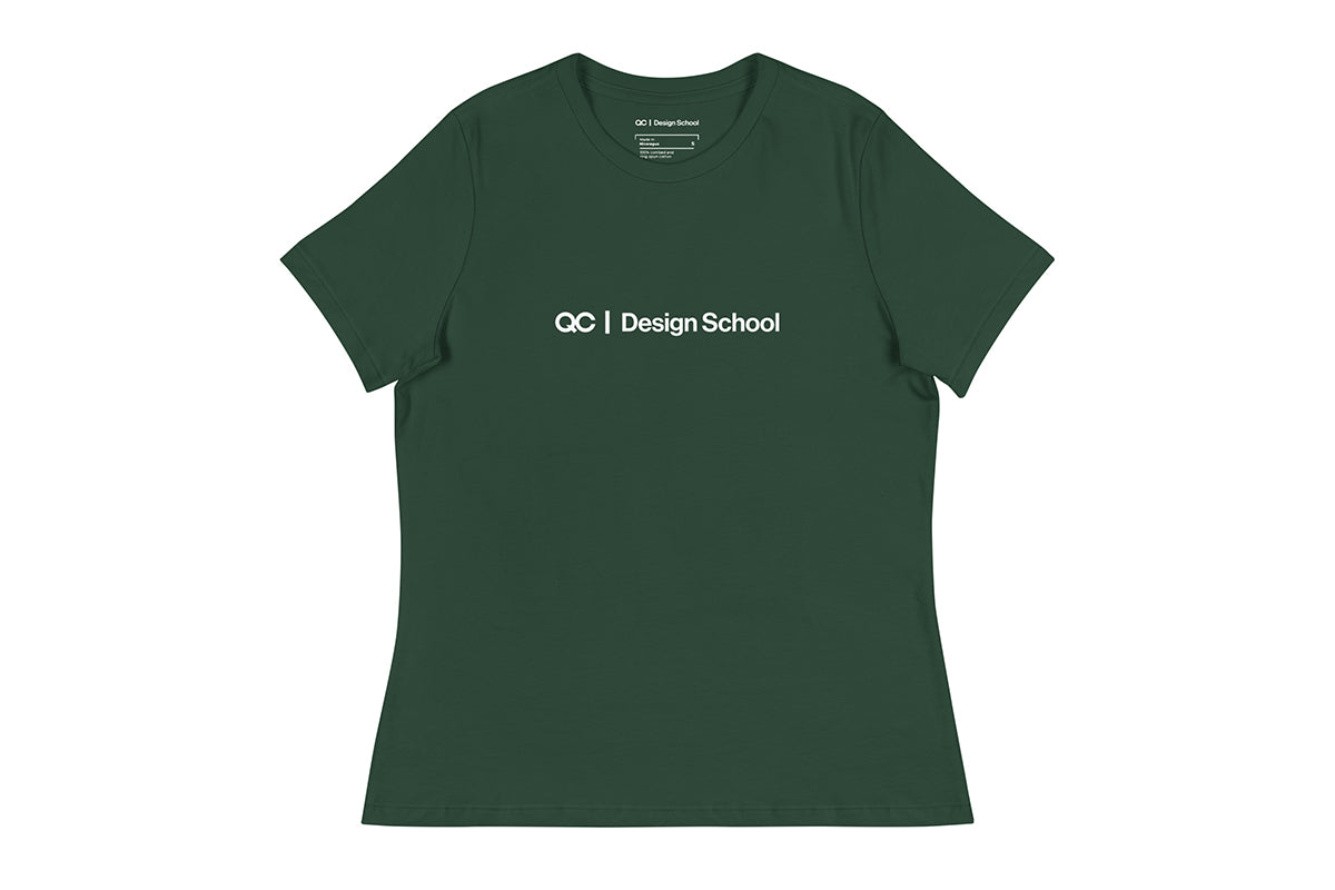 Green t-shirt that reads "QC Design School"