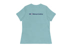 Back of light blue t-shirt with 'QC Makeup Academy' text on the back against a white background
