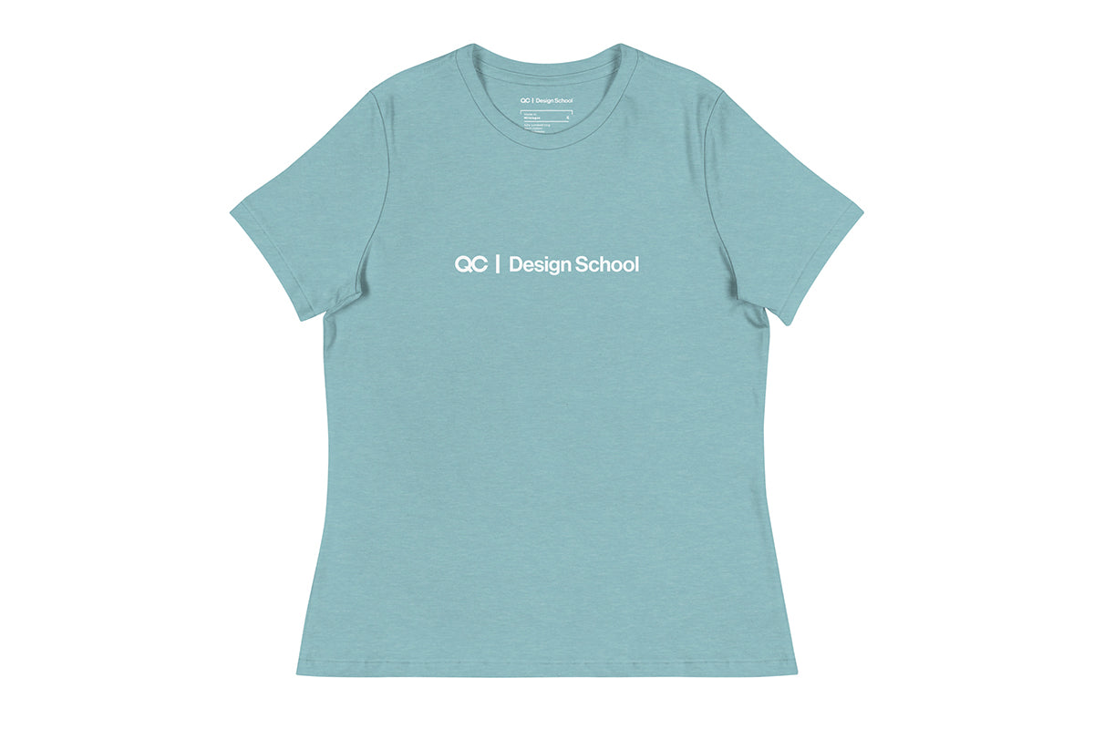 Light blue t-shirt that reads "QC Design School"
