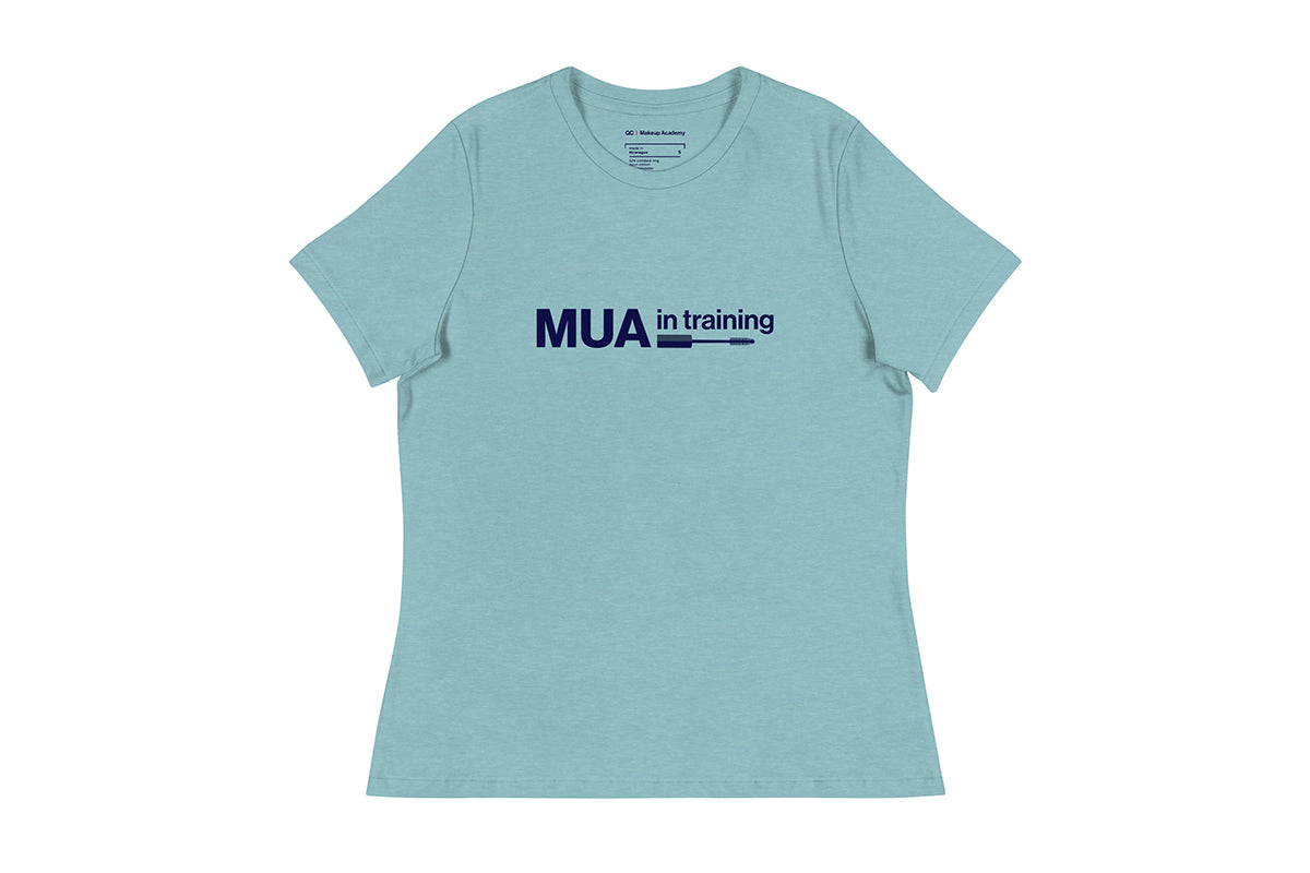 Light blue t-shirt with 'MUA in training' text on a white background