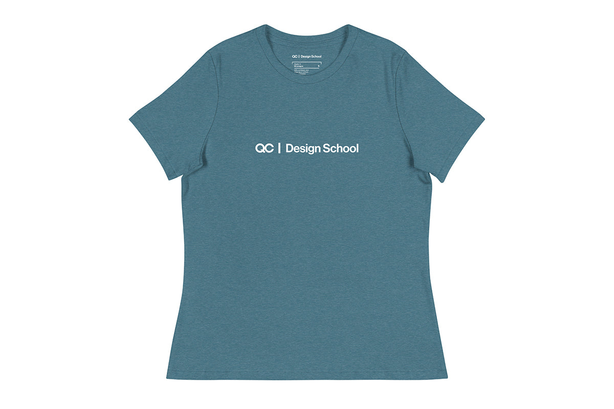 Blue t-shirt that reads "QC Design School"