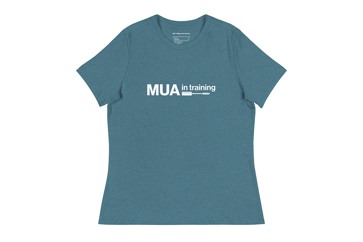 Blue t-shirt with 'MUA in training' text on a white background