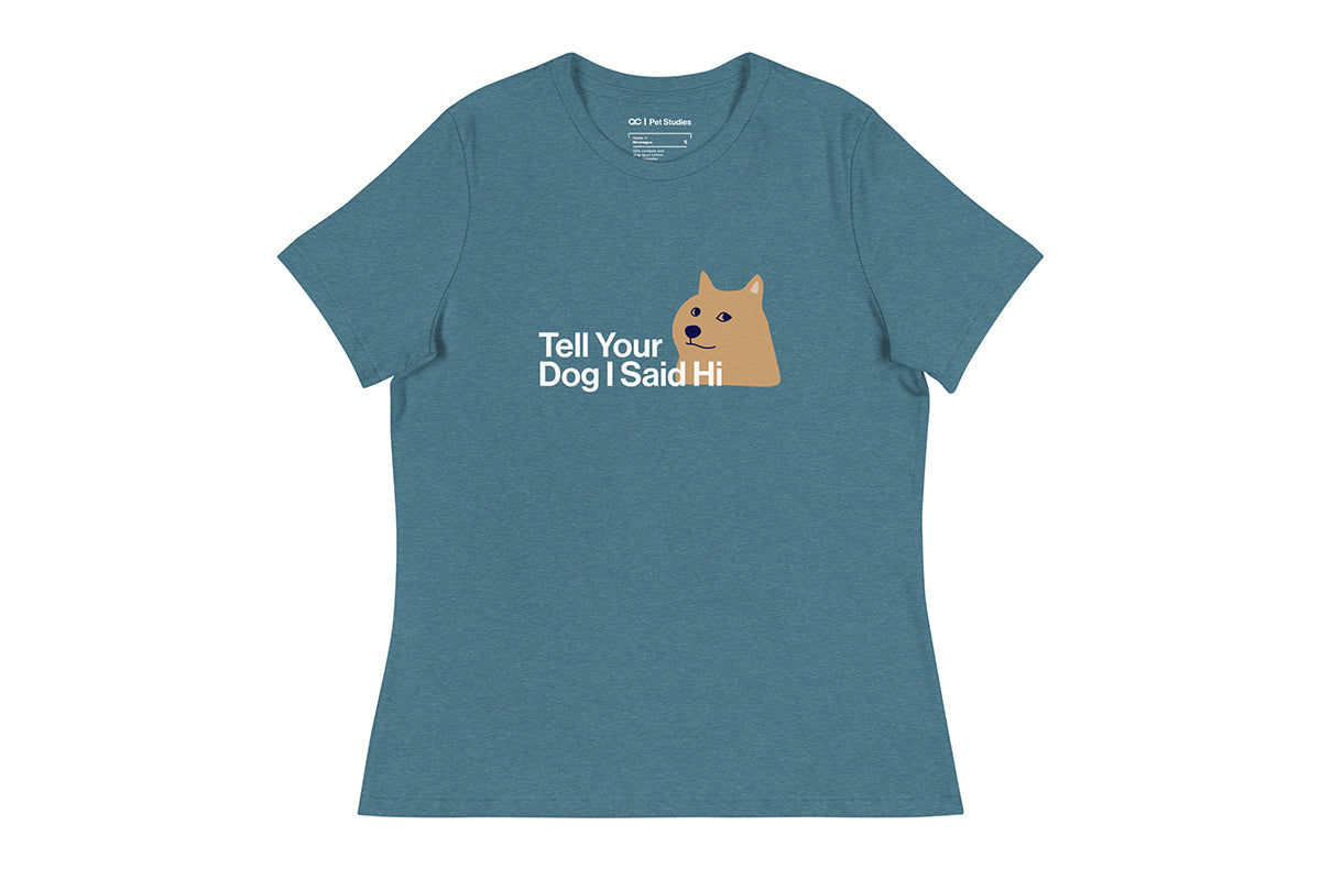 Blue t-shirt with a graphic of a dog and text that reads "Tell Your Dog I Said Hi" on a white background