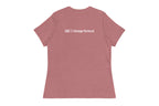 Pink t-shirt with 'QC Design School' text on the back against a white background