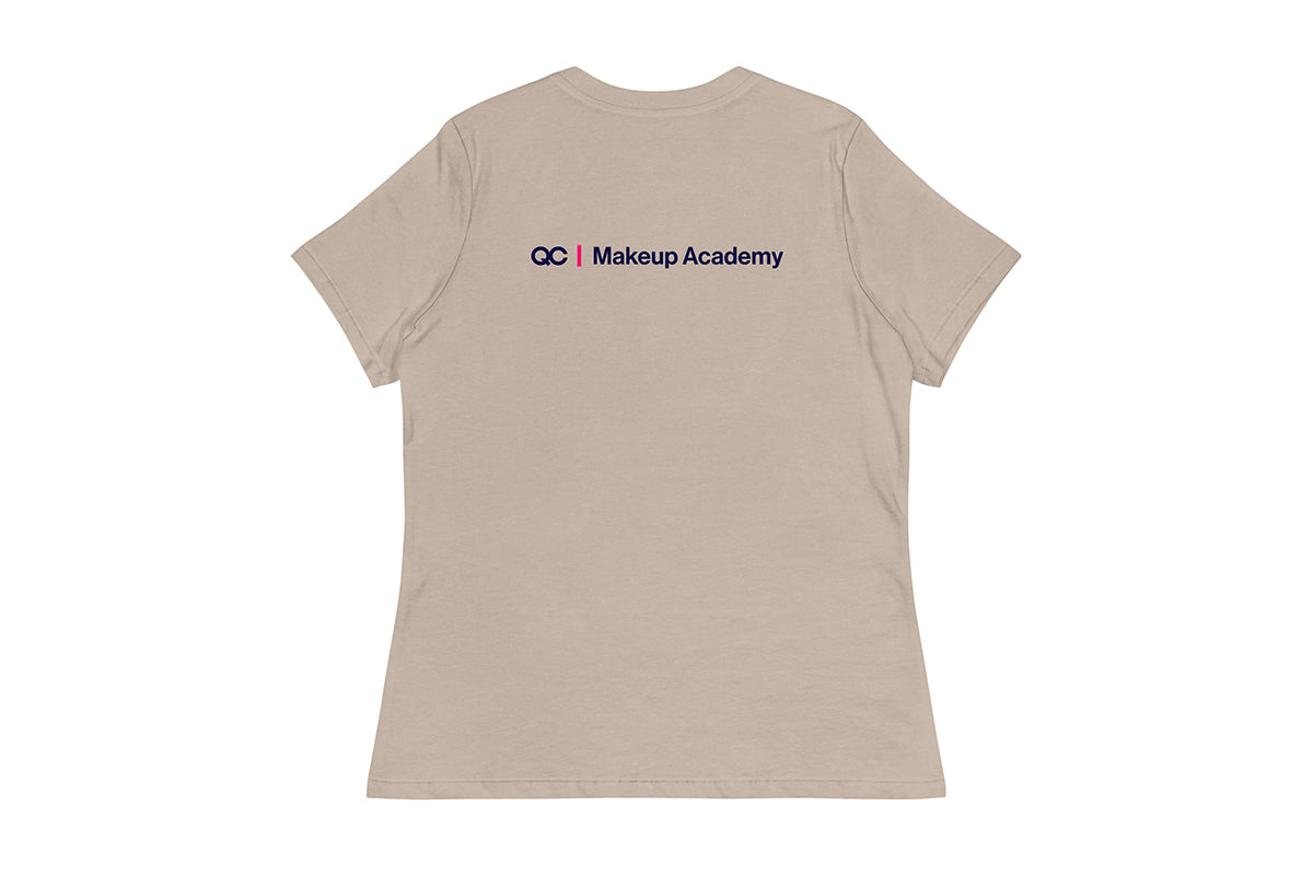 Back of beige t-shirt with 'QC Makeup Academy' logo on the back against a white background