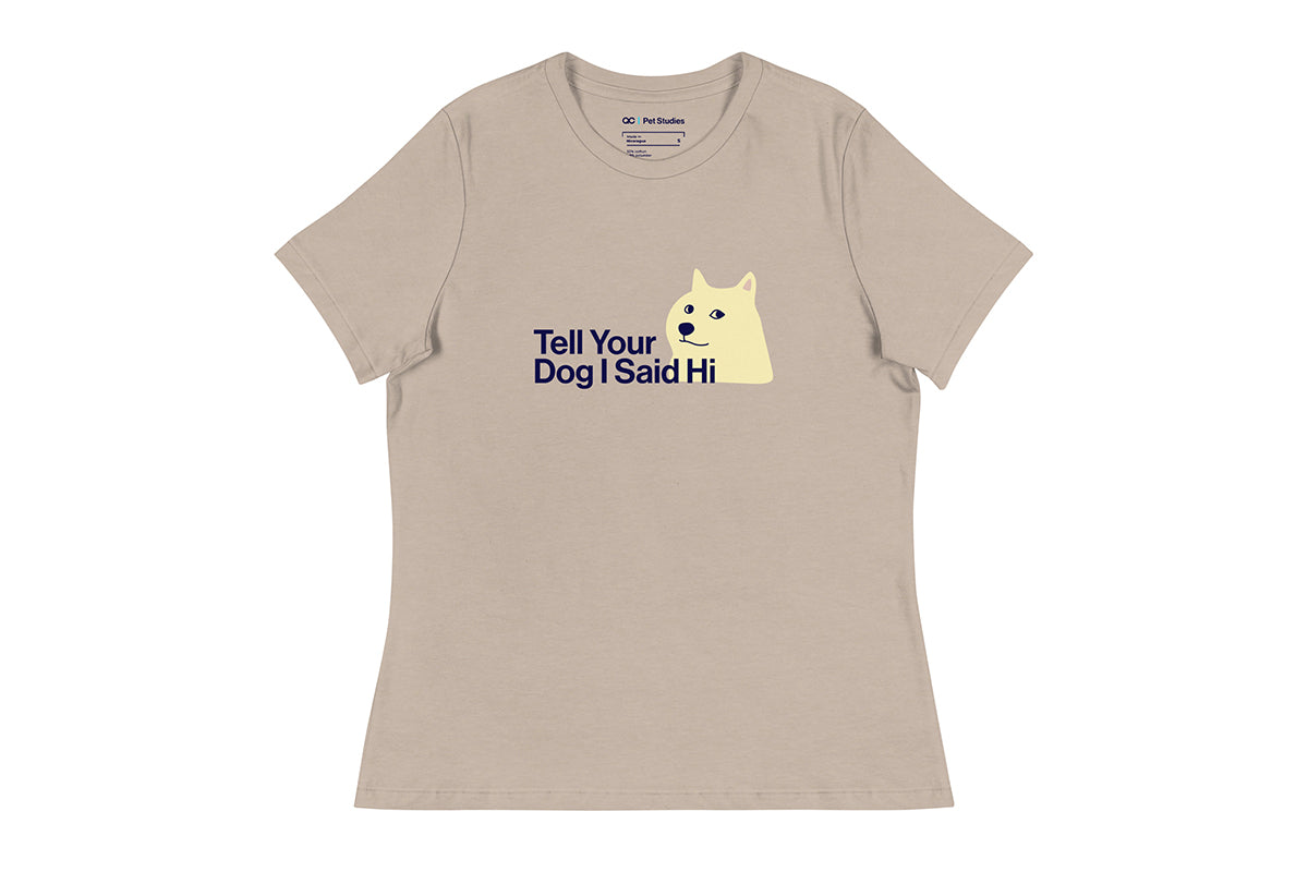 Beige t-shirt with a graphic of a dog and text 'Tell Your Dog I Said Hi' on a white background