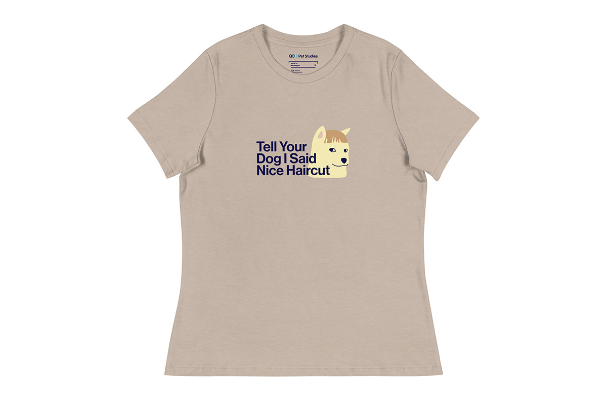 Beige t-shirt with a graphic of a dog and text on a white background