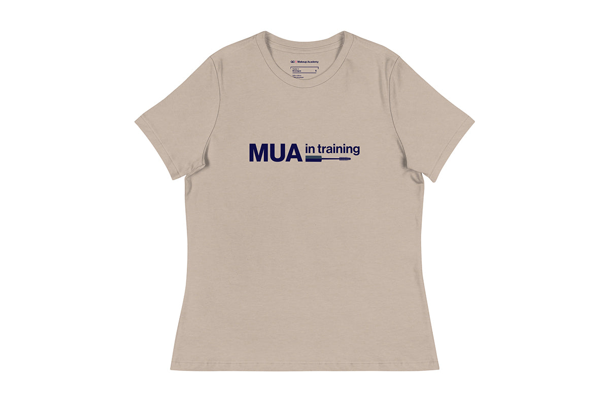 Beige t-shirt with 'MUA in training' text on a white background
