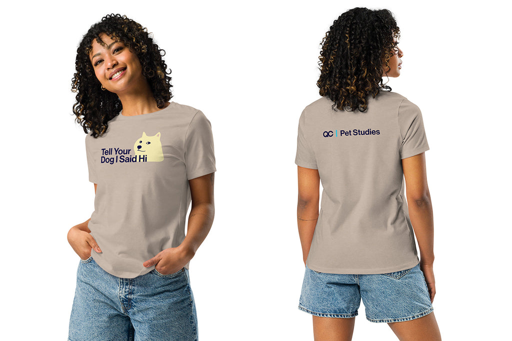 Person wearing a beige t-shirt with text and graphics on a white background