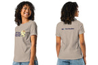 Woman wearing a beige t-shirt with text and graphics on a white background