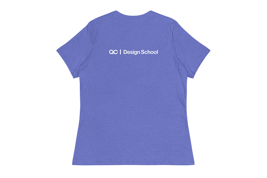 Blue t-shirt with 'QC Design School' text on the back against a white background