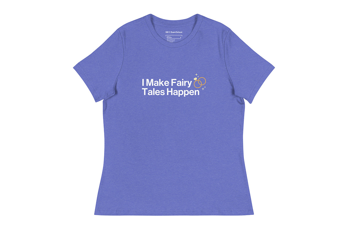 Blue t-shirt with text 'I Make Fairy Tales Happen' on a white background