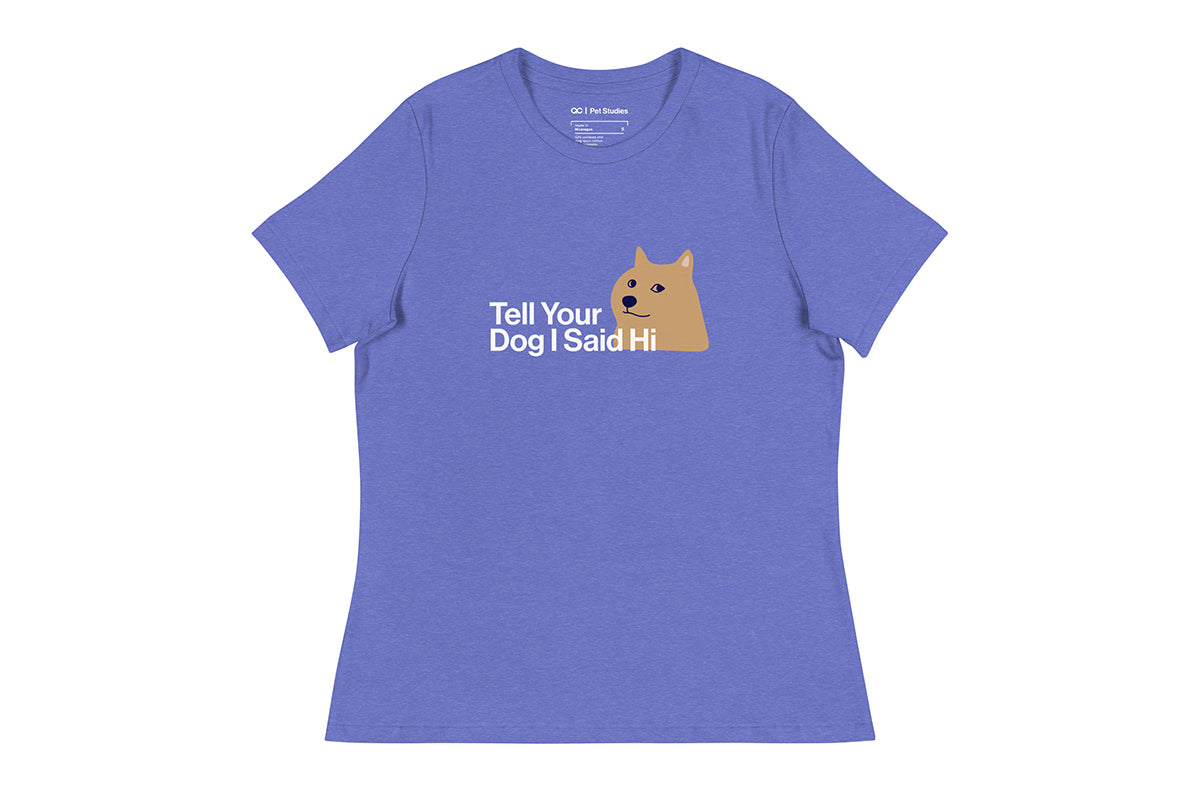 Blue t-shirt with a graphic of a dog and text that reads "Tell Your Dog I Said Hi" on a white background