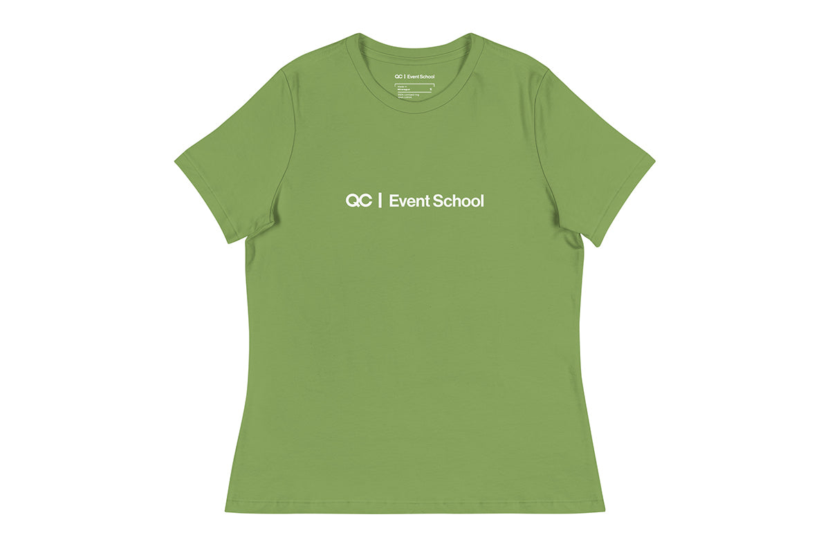 Light green t shirt that reads QC Event School