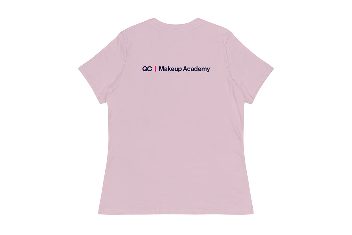 Back of purple t-shirt with 'QC Makeup Academy' text on a white background
