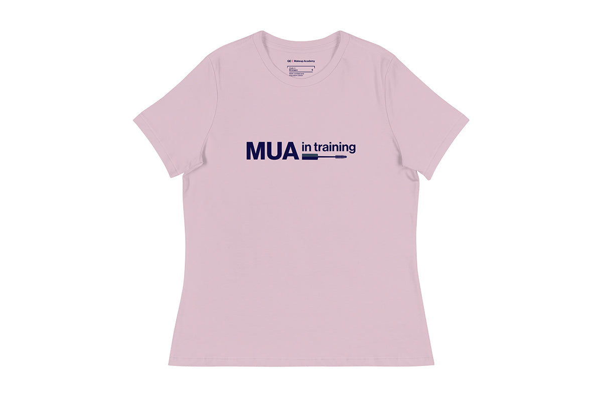 Pink t-shirt with 'MUA in training' text on a white background