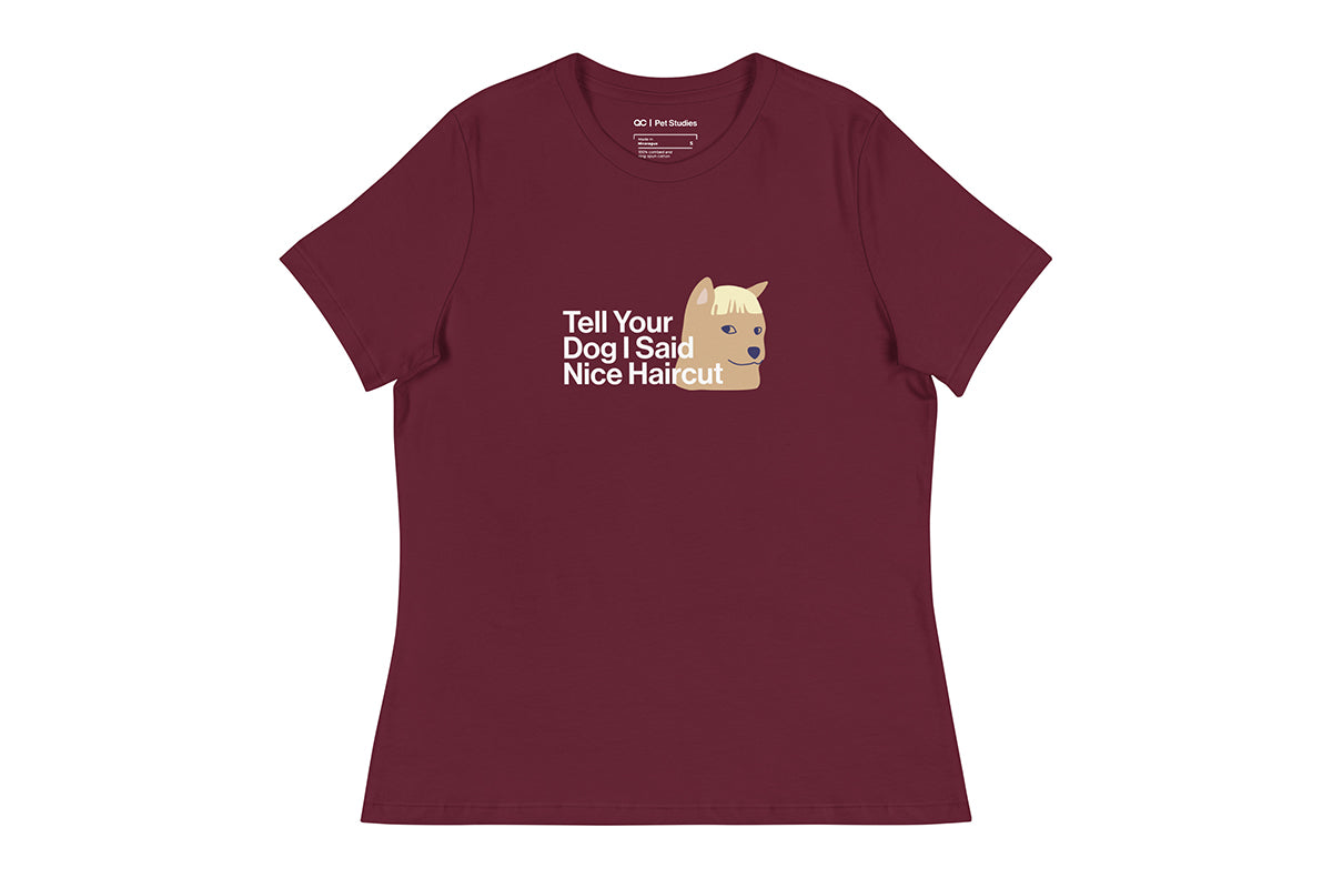 Maroon t-shirt with a graphic of a dog and text that reads "Tell Your Dog I Said Nice Haircut" on a white background
