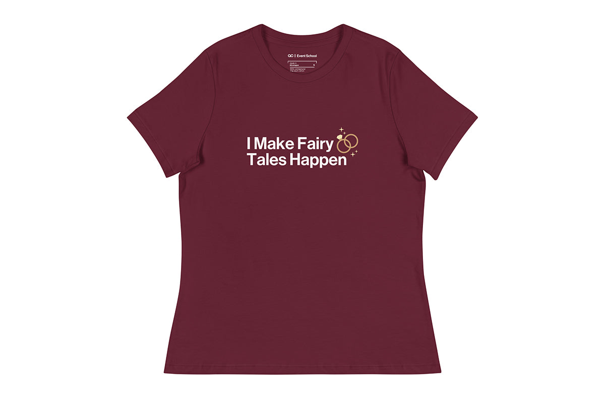 Maroon t-shirt with text 'I Make Fairy Tales Happen' on a white background