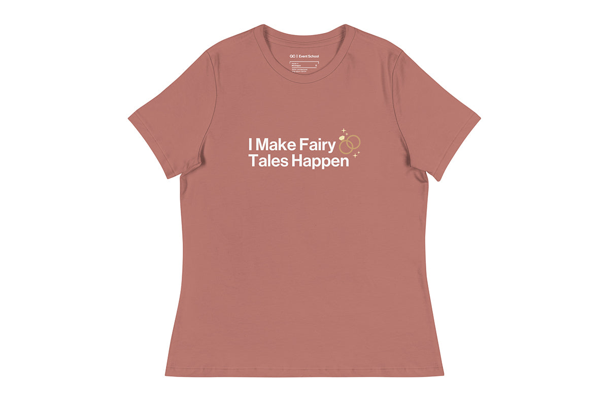 Pink t-shirt with 'I Make Fairy Tales Happen' text on a white background