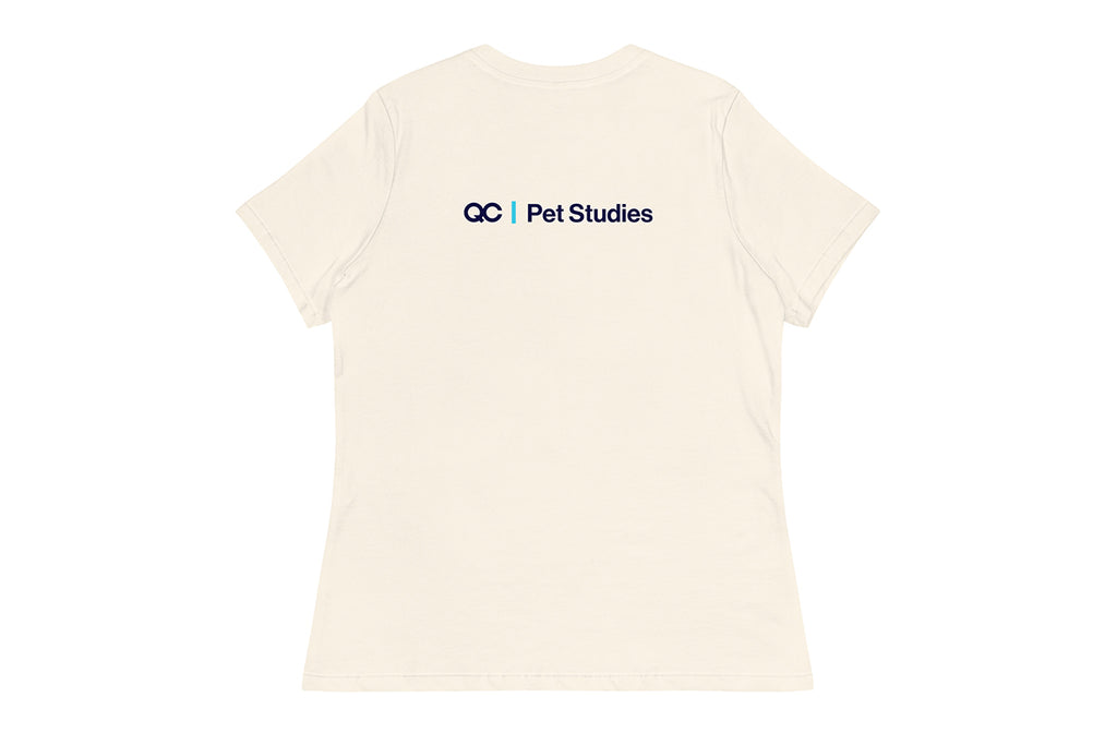 Beige t-shirt with 'QC Pet Studies' logo on the back against a white background
