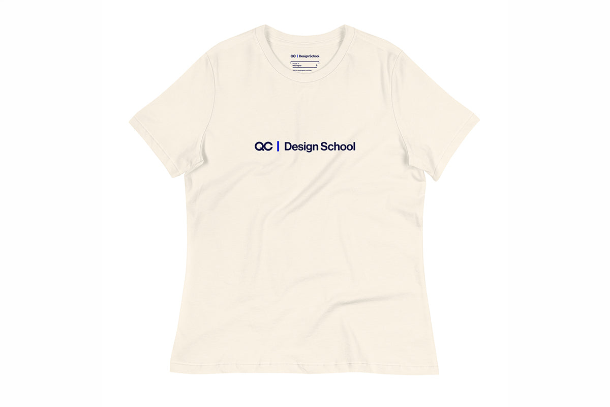 Beige t-shirt with 'QC Design School' logo on a white background