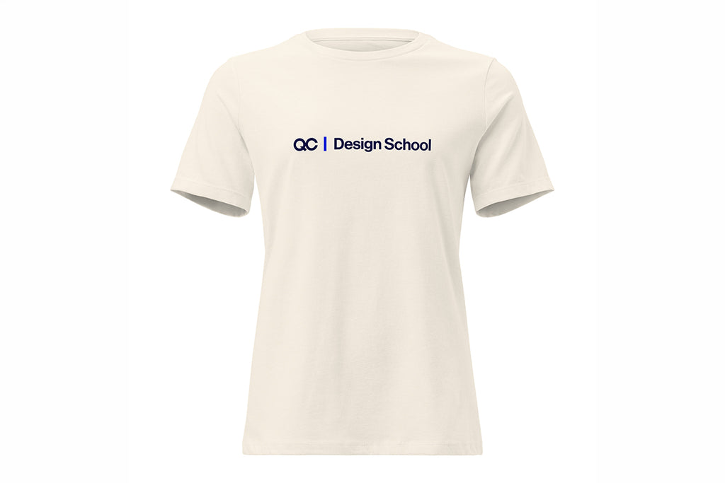 Beige t-shirt with QC Design School logo on a white background
