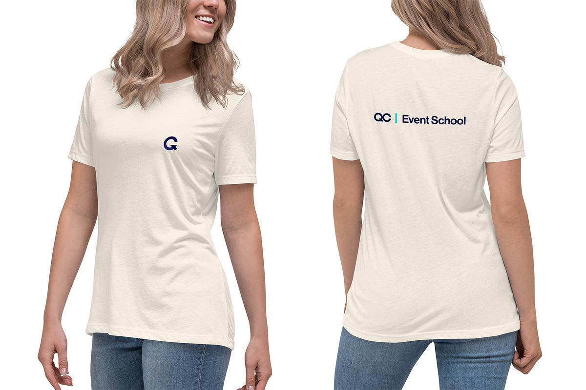 Beige t-shirt with a Q logo on front and QC Event School on the back worn by a person, on a white background
