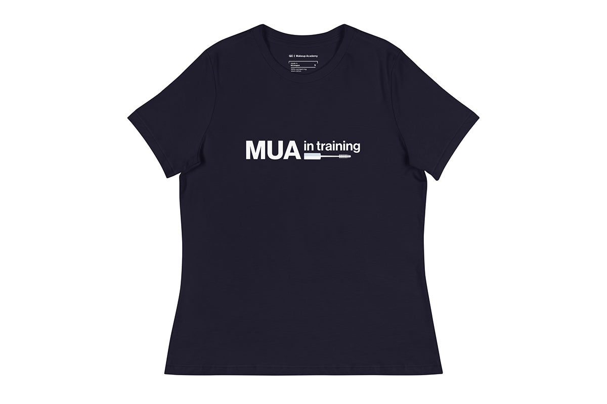 Navy t-shirt with 'MUA in training' text on a white background