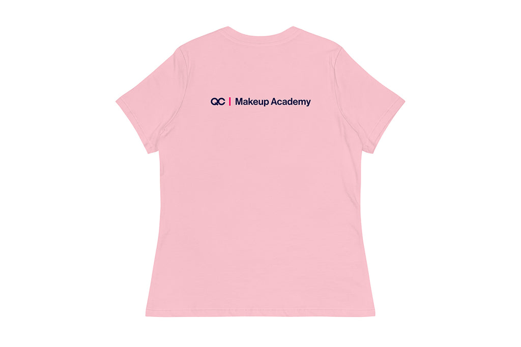 Back of pink t-shirt with 'QC Makeup Academy' text on a white background