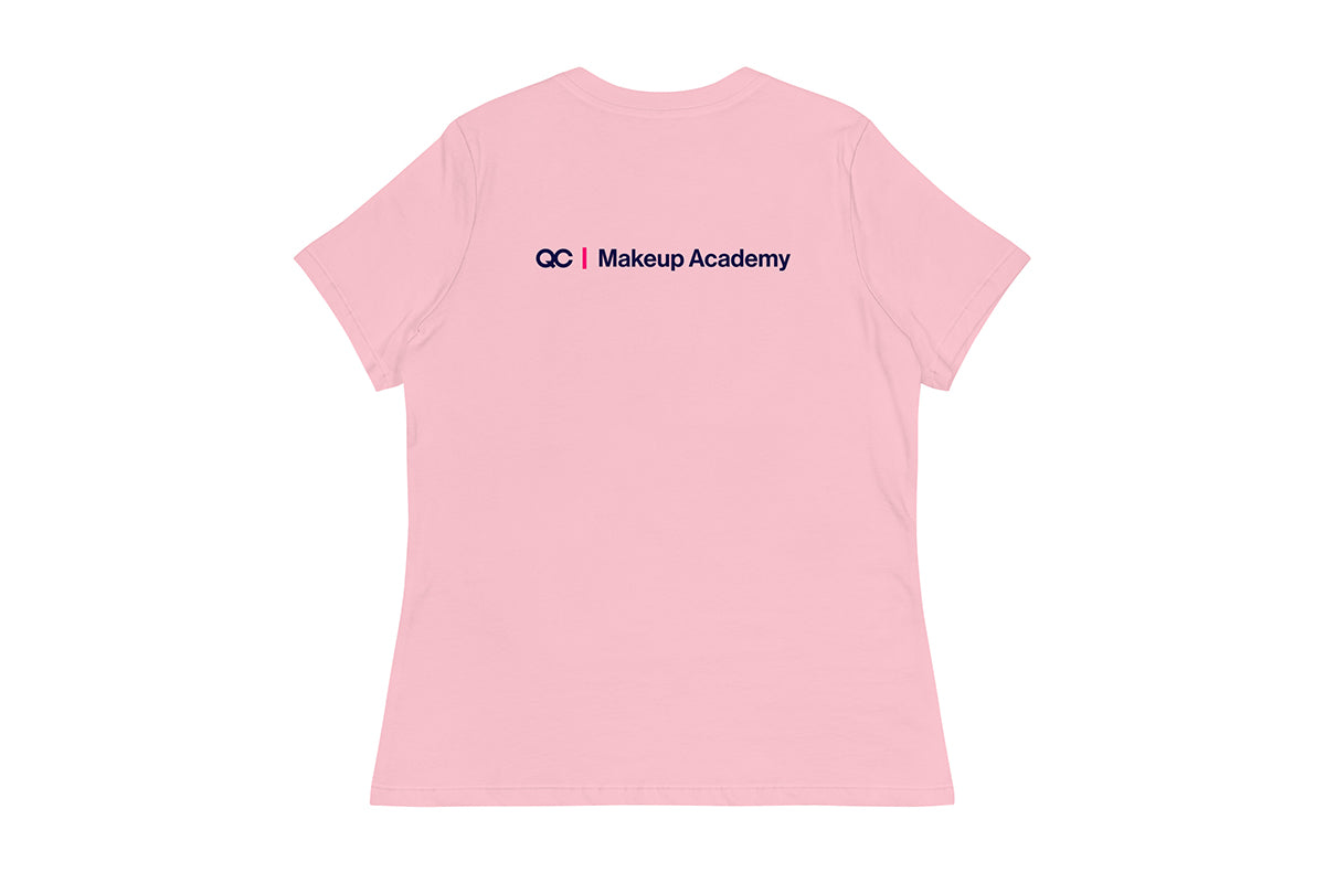 Back of pink t-shirt with 'QC Makeup Academy' text on a white background