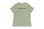 Back of light green t-shirt with 'QC Makeup Academy' text on the back against a white background