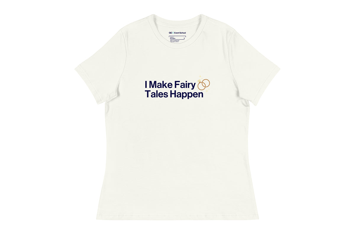 Off-white t-shirt with text 'I Make Fairy Tales Happen' on a white background