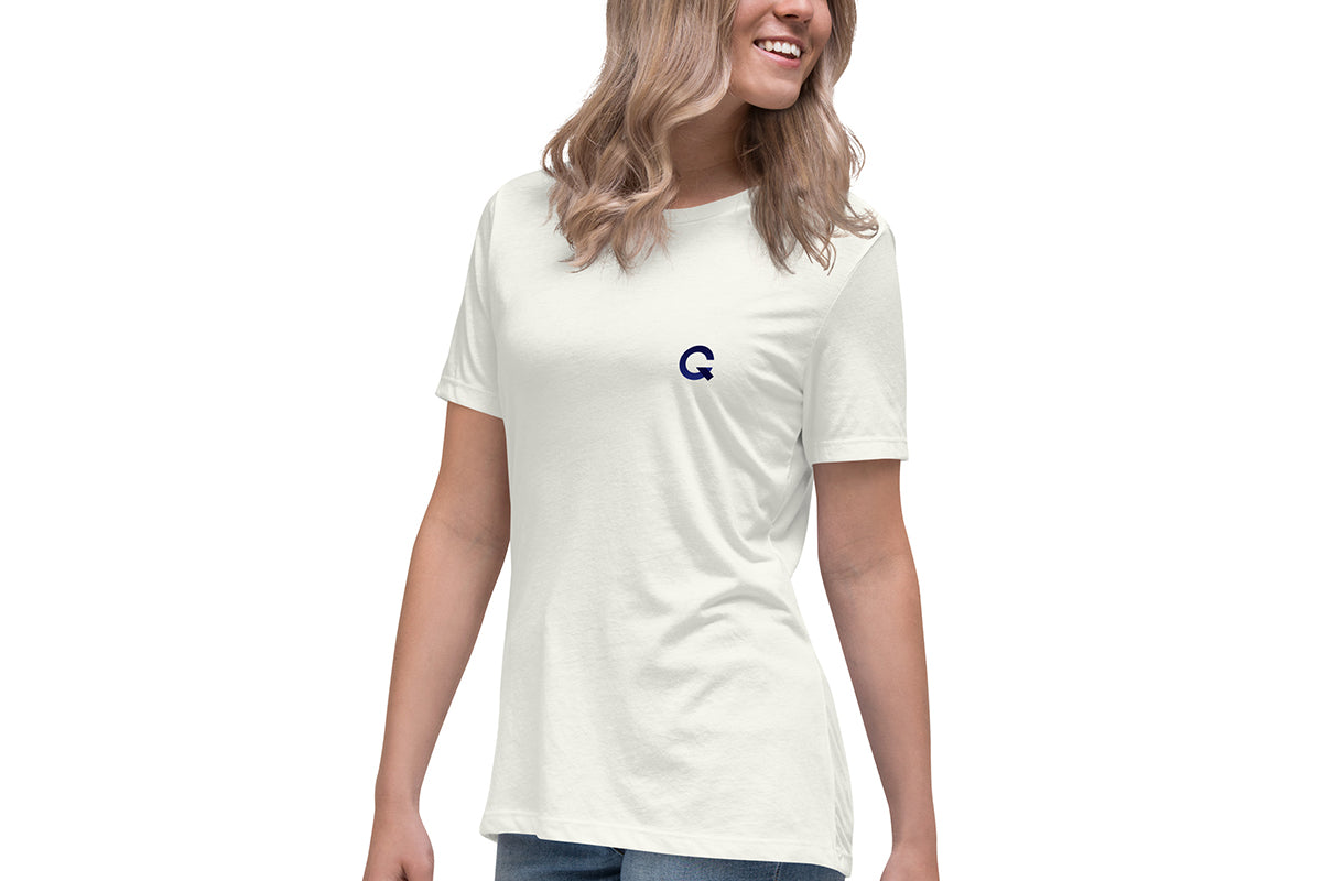 Woman wearing a white t-shirt with a Q logo on a white background