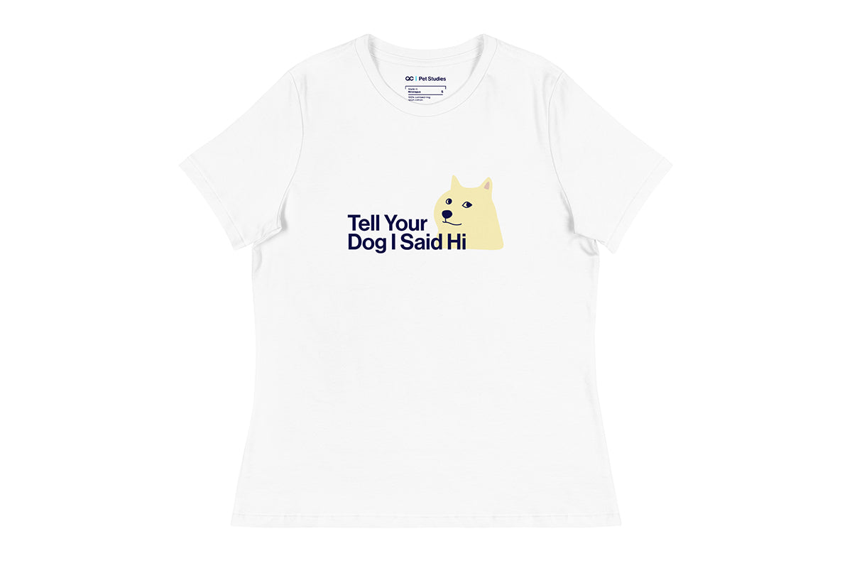 White t-shirt with a graphic of a dog and text 'Tell Your Dog I Said Hi' on a white background