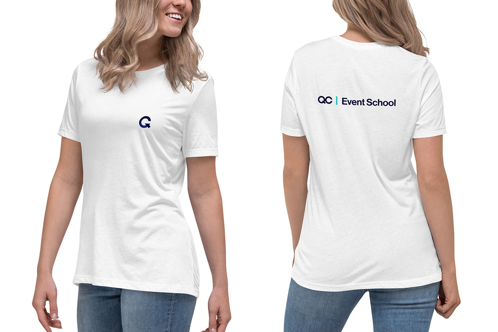White t-shirt with a Q logo on the front and 'QC Event School' on the back, worn by a person.